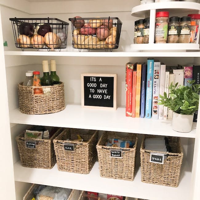 Organized pantry with wicker baskets